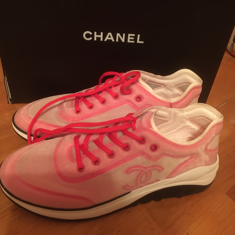 Chanel “Sport Sprint” meshed runners in a size 13 US. Pinkish red and white.